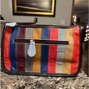 Leather clutch with strap. New, never used